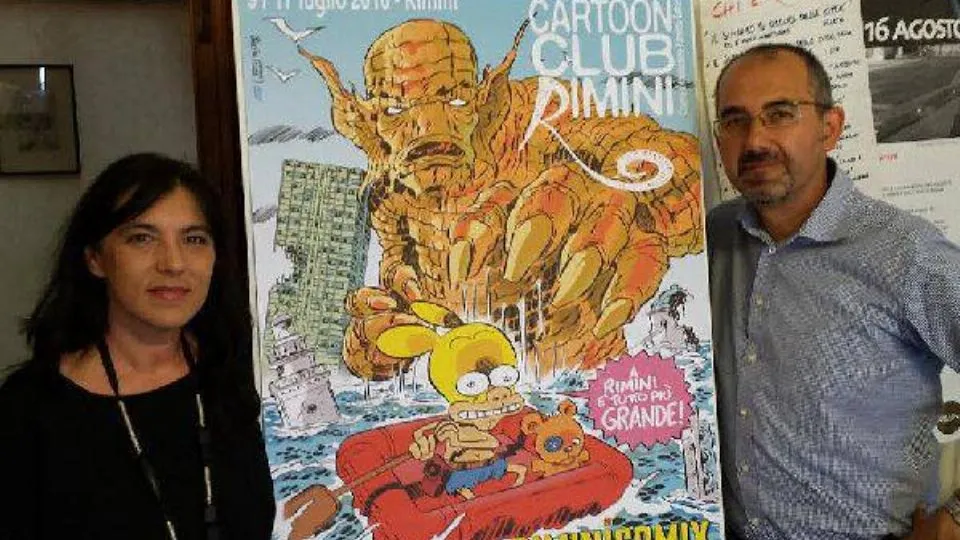 Sabrina Zanetti e Paolo Guiducci posano accanto al manifesto 2016
