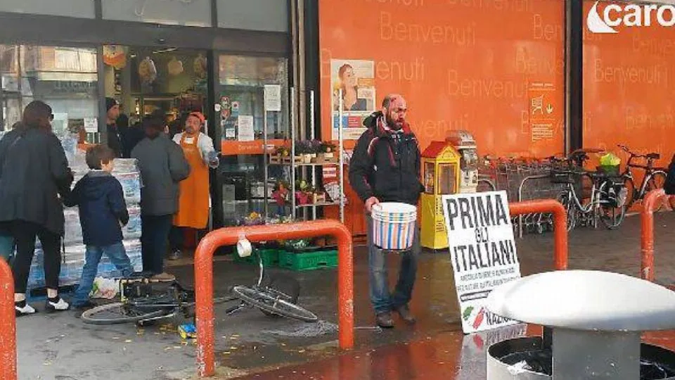 il piazzale davanti al Conad, teatro della rissa, e Roberto Lo Giudice di FN ferito