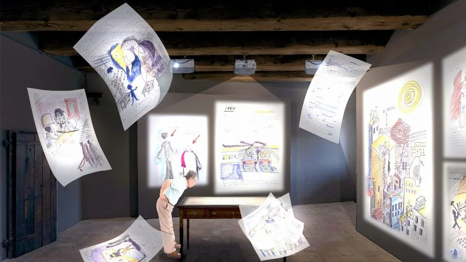 le pagine del Libro dei Sogni che si spargono virtualmente nella stanza
