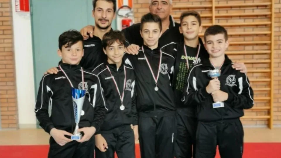 La squadra maschile con gli allenatori Blasi e Pellizzola