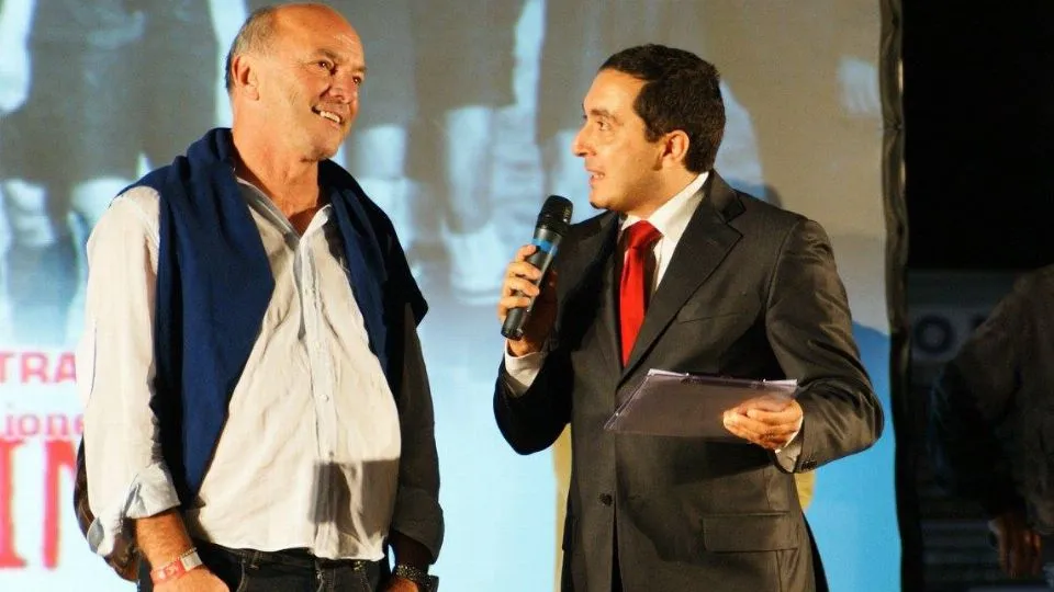 Beppe Fagni e Roberto Bonfantini sul palco per la festa del centenario della Rimini Calcio (Foto Rimini 100)