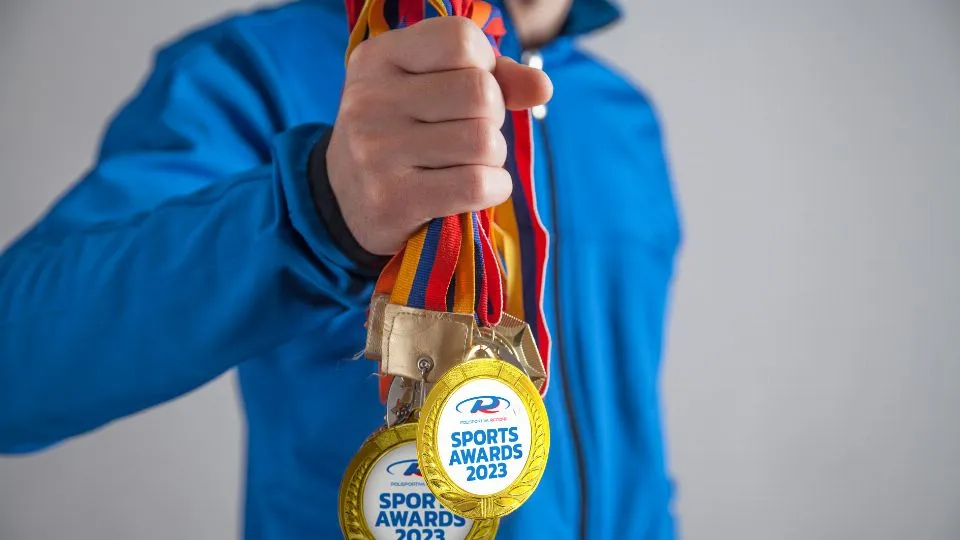 Sportsman with medals. Sport, Winner, Success
