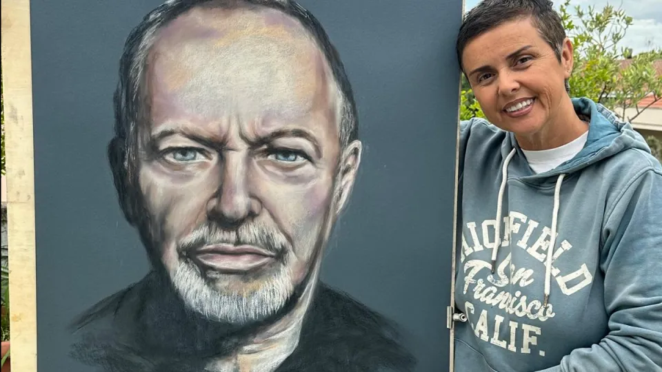 La pittrice Camporesi con il quadro